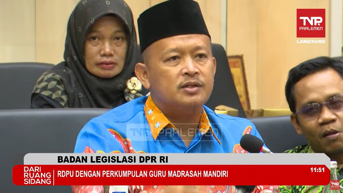 Ketua Punggawa Guru Madrasah Nasional Indonesia (PGMNI), H. Henny Purnama,